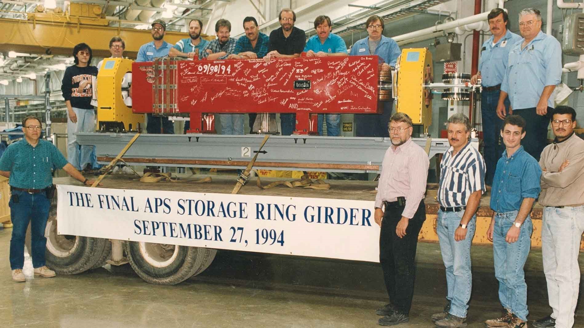 The final module of magnets to be installed in the Advanced Photon Source, seen here just before transport and installation in September 1994. Among the people who signed it are Edmund ​“Elroy” Chang, top left, and Ralph Bechtold, top row fifth from left. (Image by Argonne National Laboratory.)