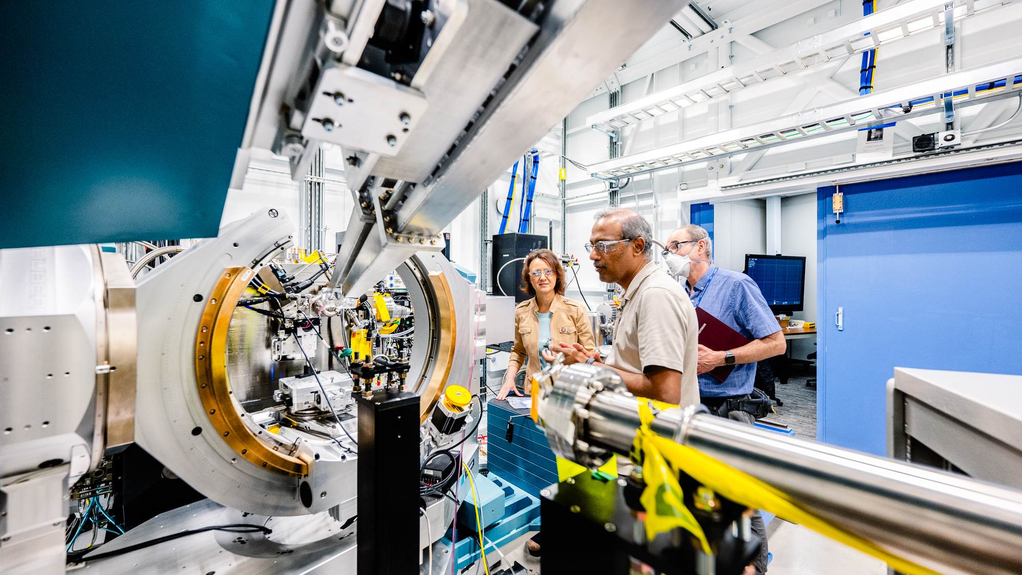 People working on a machine