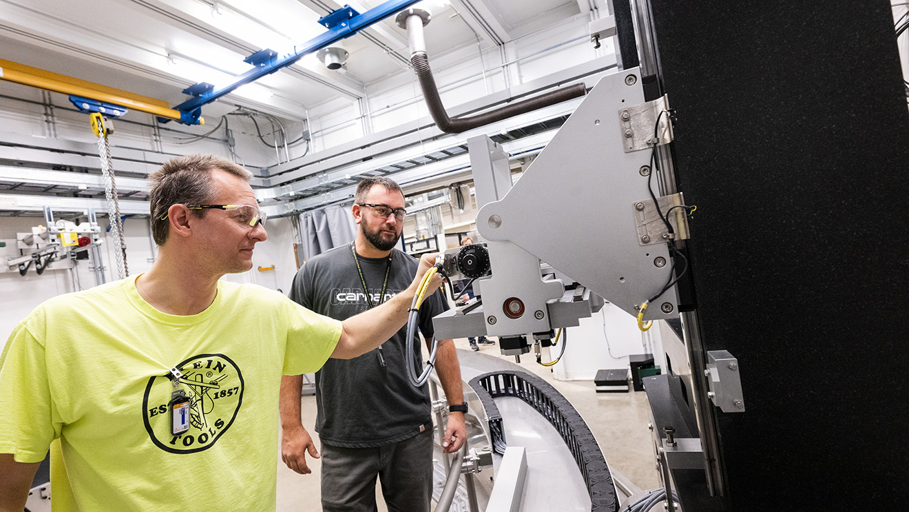 Members of the APS beamline team work on constructing and updating beamlines at the Advanced Photon Source.