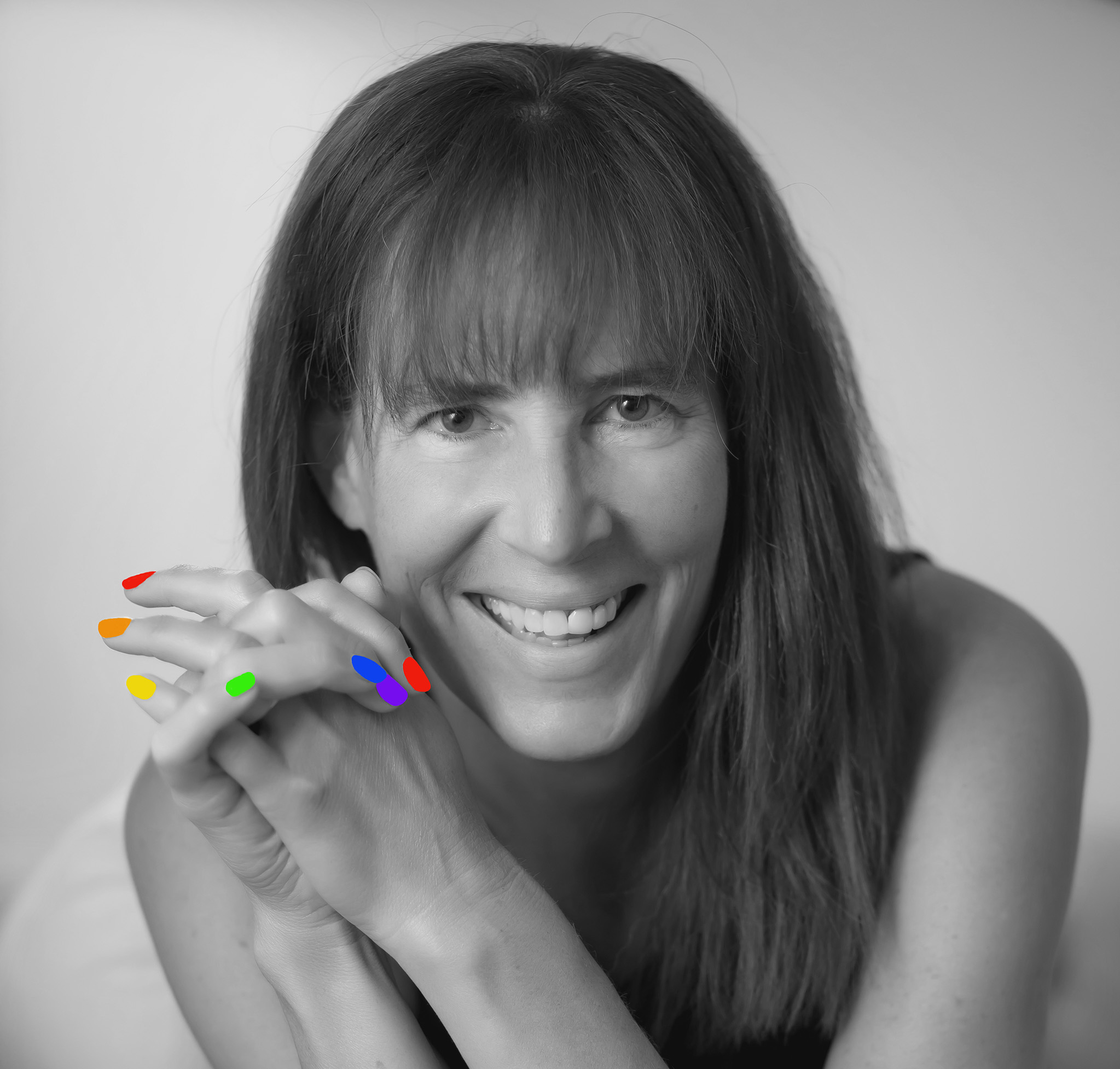 Headshot of woman smiling.