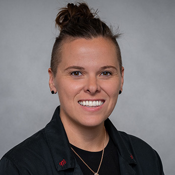 Headshot of woman smiling.